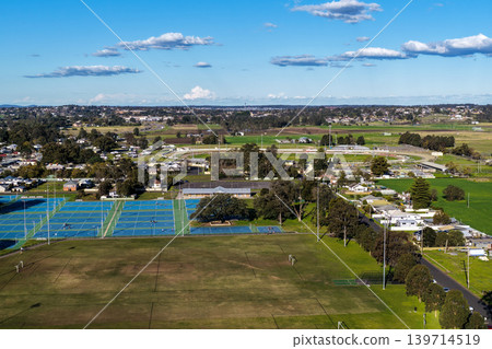 Aerial drone view of sports complex in Maitland Park, Maitland, New South Wales, Australia showing multiple playing fields and recreational facilities. Aerial drone view of sports complex in Maitland Park, Maitland, New South Wales, Australia showing multiple playing fields and recreational facilities. 139714519
