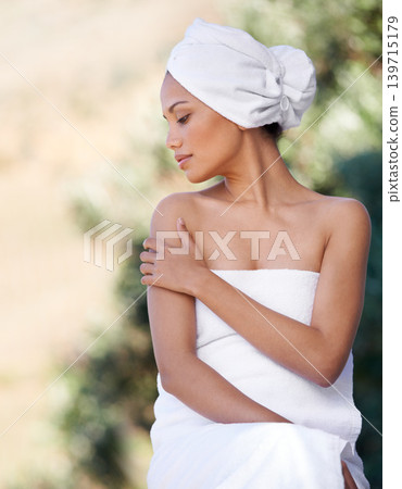 Spa, touch skin and woman in towel for beauty, healthy skincare and wellness outdoor. Relax, body and young person at salon for pamper treatment, luxury therapy or calm peace of girl in nature resort Spa, touch skin and woman in towel for beauty, healthy skincare and wellness outdoor. Relax, body and young person at salon for pamper treatment, luxury therapy or calm peace of girl in nature resort 139715179