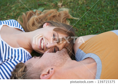 Grass field, love and portrait of happy woman, couple or people relax for outdoor sunshine, wellness or romantic date. Smile, commitment and face of woman lying with partner on pitch, garden or lawn Grass field, love and portrait of happy woman, couple or people relax for outdoor sunshine, wellness or romantic date. Smile, commitment and face of woman lying with partner on pitch, garden or lawn 139715375