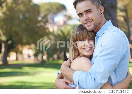 Portrait, hug and couple with love, outdoor and happiness with marriage and bonding together. Face, embrace and man with woman and outdoor for a date with weekend break and summer with romance or joy 139715422