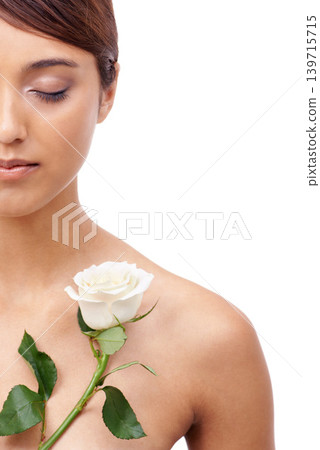 Woman, rose and makeup with eyes closed, beauty and model for skincare cosmetics on white background. Dermatology, wellness and mockup space with shine, flower or organic for glow with healthy skin Woman, rose and makeup with eyes closed, beauty and model for skincare cosmetics on white background. Dermatology, wellness and mockup space with shine, flower or organic for glow with healthy skin 139715715