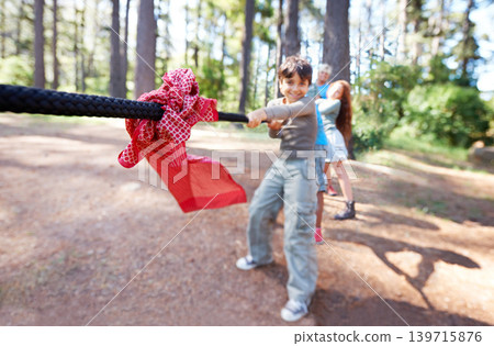 Pull. Children, game and tug of war in forest, summer camp and holiday with travel and energy outdoor. Kids, adventure and team building with competition, playful and young people in group for fun. Pull. Children, game and tug of war in forest, summer camp and holiday with travel and energy outdoor. Kids, adventure and team building with competition, playful and young people in group for fun. 139715876