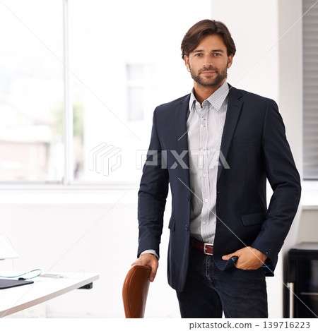 Portrait, office and businessman at startup with confidence, casual fashion and small business. Creative professional, art director and entrepreneur at desk with pride, project management and smile. 139716223