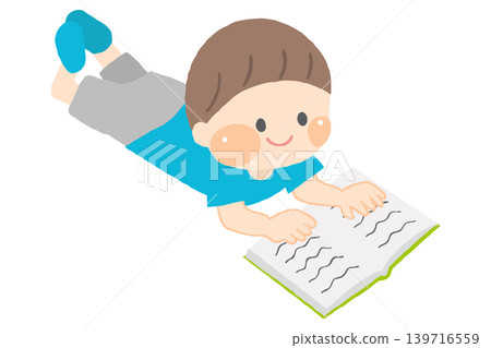 A boy lying down and reading 139716559