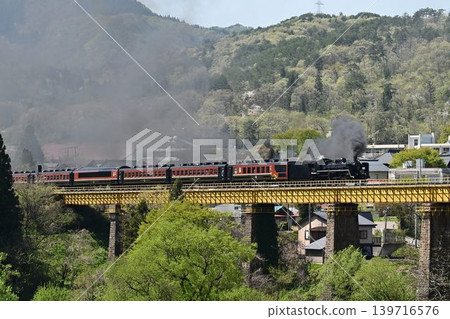Banetsu Monogatari steam locomotive going through the Ichinotogawa Bridge on the Ban-Etsusai Line Banetsu Monogatari steam locomotive going through the Ichinotogawa Bridge on the Ban-Etsusai Line 139716576