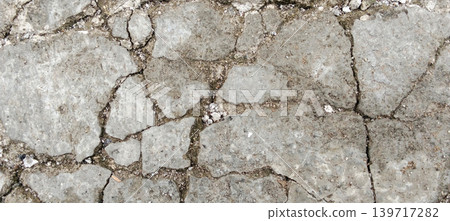 Cracked concrete texture and damaged road surface Cracked concrete texture and damaged road surface 139717282