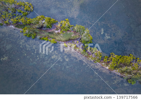 Aerial view of Wallis Lake in Forster NSW Australia. Drone photograph captures the expansive lake system, clear waterways and surrounding coastal landscape Aerial view of Wallis Lake in Forster NSW Australia. Drone photograph captures the expansive lake system, clear waterways and surrounding coastal landscape 139717566