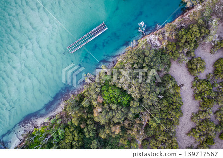 Aerial view of Wallis Lake in Forster NSW Australia. Drone photograph captures the expansive lake system, clear waterways and surrounding coastal landscape Aerial view of Wallis Lake in Forster NSW Australia. Drone photograph captures the expansive lake system, clear waterways and surrounding coastal landscape 139717567