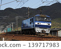 A freight train pulled by an EF210 locomotive running on the Sanyo Main Line. 139717983