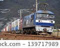 A freight train pulled by an EF210 locomotive running on the Sanyo Main Line. 139717989