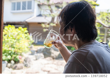Elderly woman hydrating Elderly woman hydrating 139718052