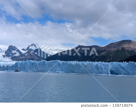 Panoramic view of glacier ice field and snow covered mountain range in Patagonia Panoramic view of glacier ice field and snow covered mountain range in Patagonia 139719074