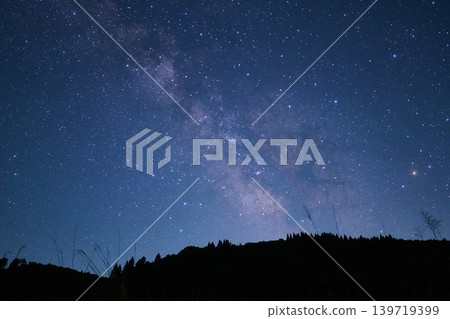 A sky full of stars stretching across the night sky, and the vibrant Milky Way. A sky full of stars stretching across the night sky, and the vibrant Milky Way. 139719399