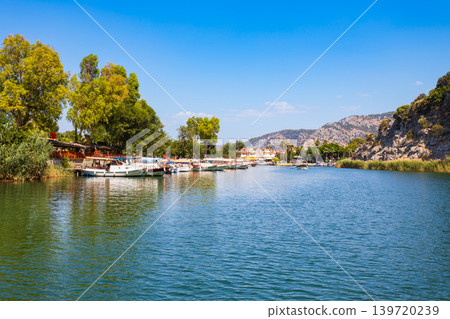Boats at Dalyan river in Dalyan town, Turkey Boats at Dalyan river in Dalyan town, Turkey 139720239