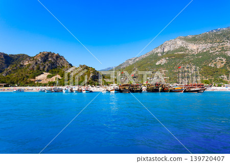 Boats at the Oludeniz beach, Fethiye district in Turkey Boats at the Oludeniz beach, Fethiye district in Turkey 139720407