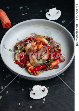 Stylishly arranged colorful vegetable and meat dish 139720911