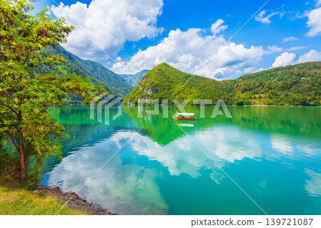 Turquoise Perucac Lake in Serbia and Bosnia border Turquoise Perucac Lake in Serbia and Bosnia border 139721087