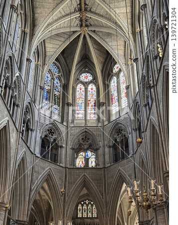 Gothic Westminster Abby Interior With Soaring Vaulted Ceiling, Arched Nave, Chandeliers and Ornate Altar Screen Gothic Westminster Abby Interior With Soaring Vaulted Ceiling, Arched Nave, Chandeliers and Ornate Altar Screen 139721304