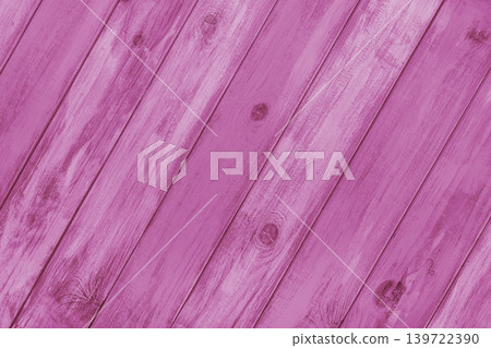 Pink colored painted wooden board with diagonal planks texture, rustic wall surface, background 139722390