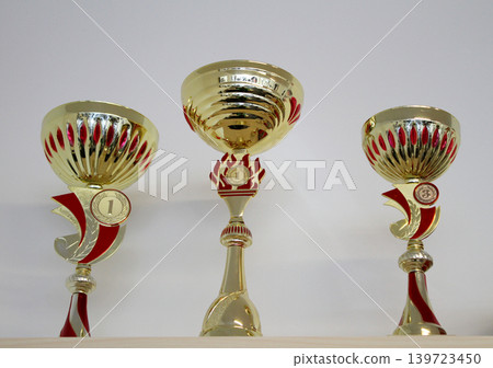 Sports cups for first and third place for winners  139723450
