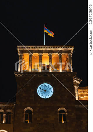 Illuminated stone clock tower of the Government of Armenia building at night Illuminated stone clock tower of the Government of Armenia building at night 139723646