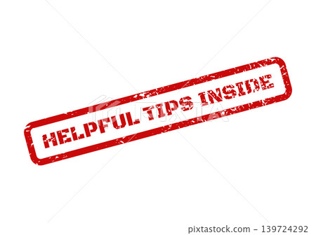 A prominent red grunge stamp featuring the words Helpful Tips Inside to reveal content A prominent red grunge stamp featuring the words Helpful Tips Inside to reveal content 139724292