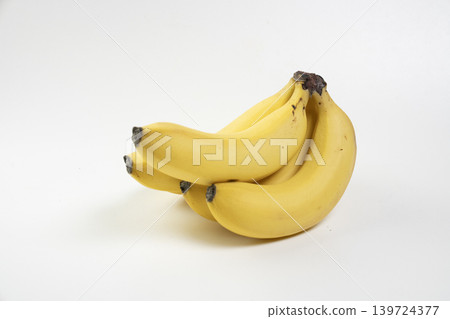 White background and a blackened yellow banana White background and a blackened yellow banana 139724377