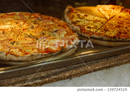 Delicious pizza in a traditional Italian pizzeria. Selective focus. 139724529