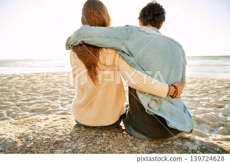 Beach hug, view and couple relax on sand rock with summer sunshine, wellness or travel holiday in Argentina. Embrace, marriage love and back of people on honeymoon, vacation and looking at sea waves Beach hug, view and couple relax on sand rock with summer sunshine, wellness or travel holiday in Argentina. Embrace, marriage love and back of people on honeymoon, vacation and looking at sea waves 139724628
