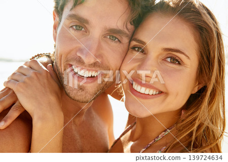 Beach, hug and portrait of couple happy for summer sunshine, wellness or travel holiday in Argentina. Care, love and face of relax boyfriend, girlfriend or people embrace for relationship bonding Beach, hug and portrait of couple happy for summer sunshine, wellness or travel holiday in Argentina. Care, love and face of relax boyfriend, girlfriend or people embrace for relationship bonding 139724634