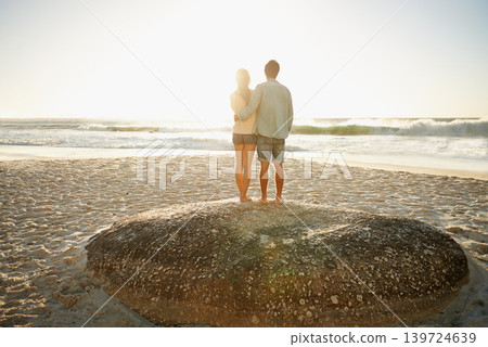 Sunrise, beach and back of couple in nature with hug, support and romance while bonding with love. Summer, travel and people embrace at sunset with ocean view mockup, space or vacation in Florida Sunrise, beach and back of couple in nature with hug, support and romance while bonding with love. Summer, travel and people embrace at sunset with ocean view mockup, space or vacation in Florida 139724639