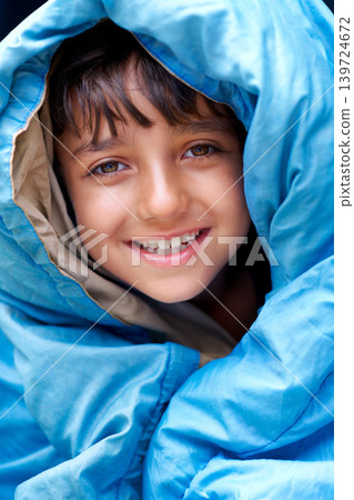 Boy, child and tent portrait for camping, relax and happy summer vacation in outdoor travel. Young camper, smile and wrapped in sleeping bag, adventure or nature with recreation for childhood 139724672