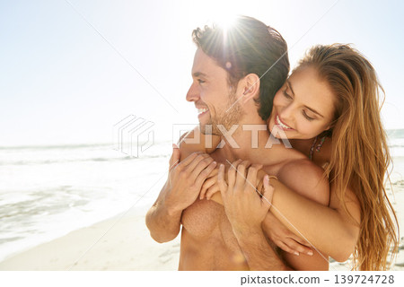 Happy couple, hug and sunshine on beach for love, care or support on holiday or outdoor weekend together. Face of man and woman smile for embrace, trust or summer travel in romance by the ocean coast Happy couple, hug and sunshine on beach for love, care or support on holiday or outdoor weekend together. Face of man and woman smile for embrace, trust or summer travel in romance by the ocean coast 139724728