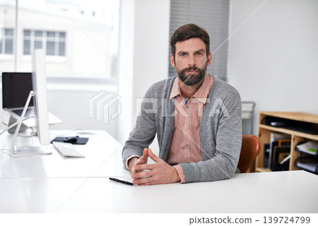 Businessman, portrait or serious at desk in modern office, professional or career pride in company. Accountant, face or confident as consultant auditing job or ambition for commitment in workplace 139724799