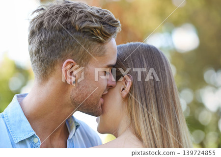 Couple in a park, romance and hug with happiness, summer and marriage with weekend break and bonding together. Outdoor for a date, man and woman with relationship and moment with love and vacation Couple in a park, romance and hug with happiness, summer and marriage with weekend break and bonding together. Outdoor for a date, man and woman with relationship and moment with love and vacation 139724855