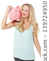 Happy, piggy bank and woman on a white background for money, savings and investment in studio. Finance mockup, cash container and excited isolated person smile for budget, investment and profit 139724950