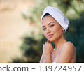 Nature, spa and portrait of young woman for skincare, wellness or healthy skin treatment. Beauty, outdoor and calm female person with towel for cosmetic, body or dermatology routine at salon resort. 139724957