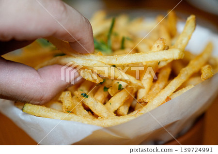Crispy Golden French Fries Fast Food Snack Close Up Crispy Golden French Fries Fast Food Snack Close Up 139724991