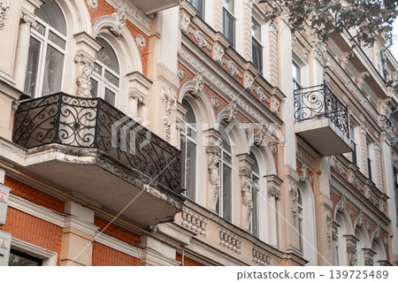 Elegant Ornate Building Facade with Balconies 139725489