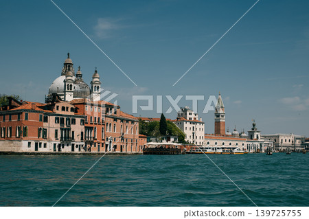 Amazing cityscape view of Venice old town and the sea. Travel destination in Italy. Amazing cityscape view of Venice old town and the sea. Travel destination in Italy. 139725755