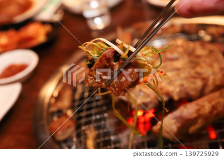 Delicious Traditional Korean Marinated Pork Ribs Barbecue Grilling Delicious Traditional Korean Marinated Pork Ribs Barbecue Grilling 139725929