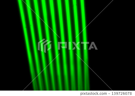 Abstract vertical green light streaks on dark background with light effect 139726078
