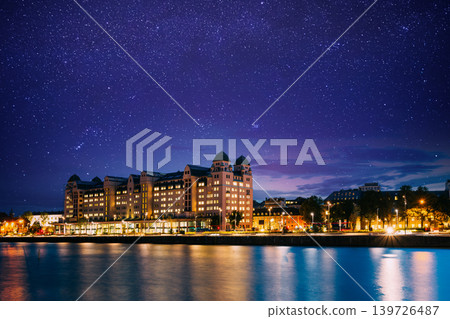 Oslo City Hall and harbor illuminated under a starry sky Oslo City Hall and harbor illuminated under a starry sky 139726487