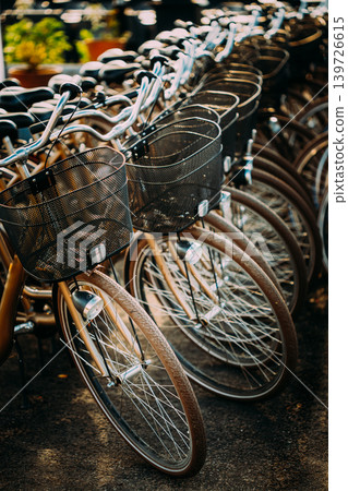 Rows of Bicycles Parked .Row of city parked bicycles bikes for rent on sidewalk in European City Stockholm, Sweden 139726615