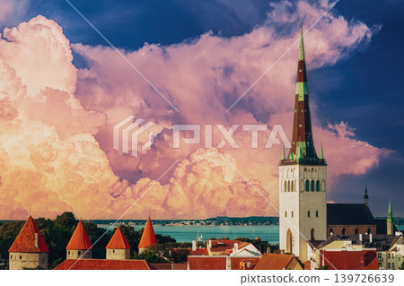 St. Olaf's Church spire and defensive walls under dramatic clouds 139726639