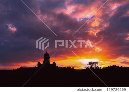 Helsinki Cathedral silhouette against a purple and orange sunset Helsinki Cathedral silhouette against a purple and orange sunset 139726669
