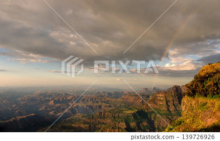 Rainbow over Simien Mountains canyon landscape in Ethiopia Rainbow over Simien Mountains canyon landscape in Ethiopia 139726926