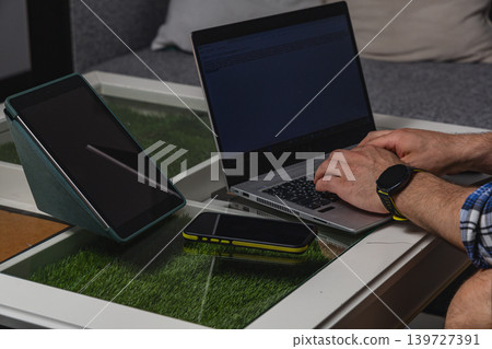 Laptop and smartphone on modern home workspace Laptop and smartphone on modern home workspace 139727391