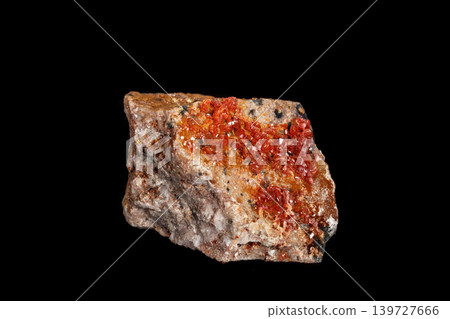 Macro mineral stone Vanadinite on a black background Macro mineral stone Vanadinite on a black background 139727666