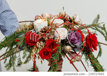 Christmas composition of fresh flowers Christmas composition of fresh flowers 139727681